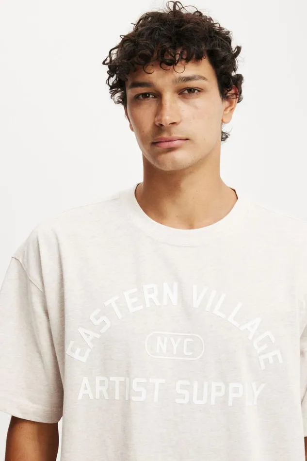 Cotton On Tees and Tanks Box Fit Graphic TShirt Oatmeal Marleeastern Village 8211 Men Cotton On Tees and Tanks Box Fit Graphic TShirt Oatmeal Marleeastern Village 8211 Men